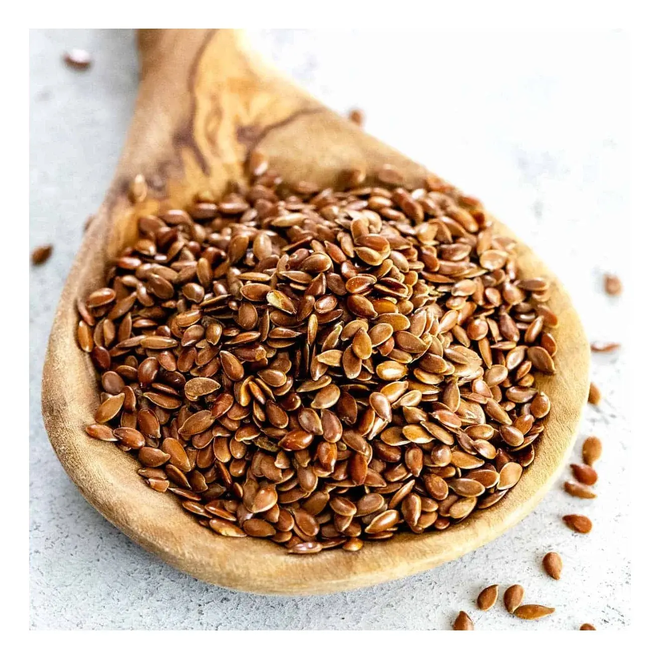 تخم کتان آسیاب شده در ظرف شیشهای برای استفاده در غذاها