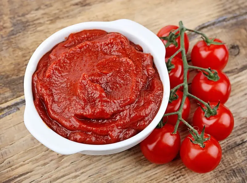 گوجه فرنگی‌های رسیده و تازه برای تولید رب با کیفیت