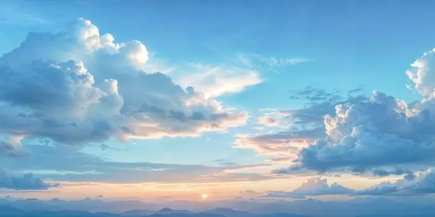 منظره زیبای آسمان با رنگهای آبی و ابرهای پراکنده